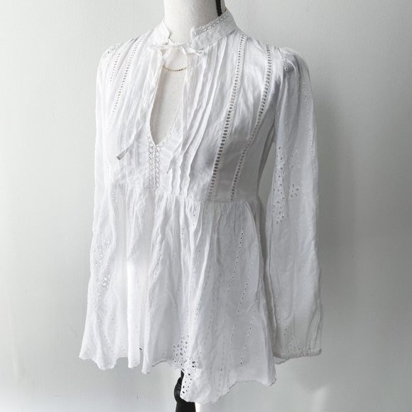 white eyelet peasant top